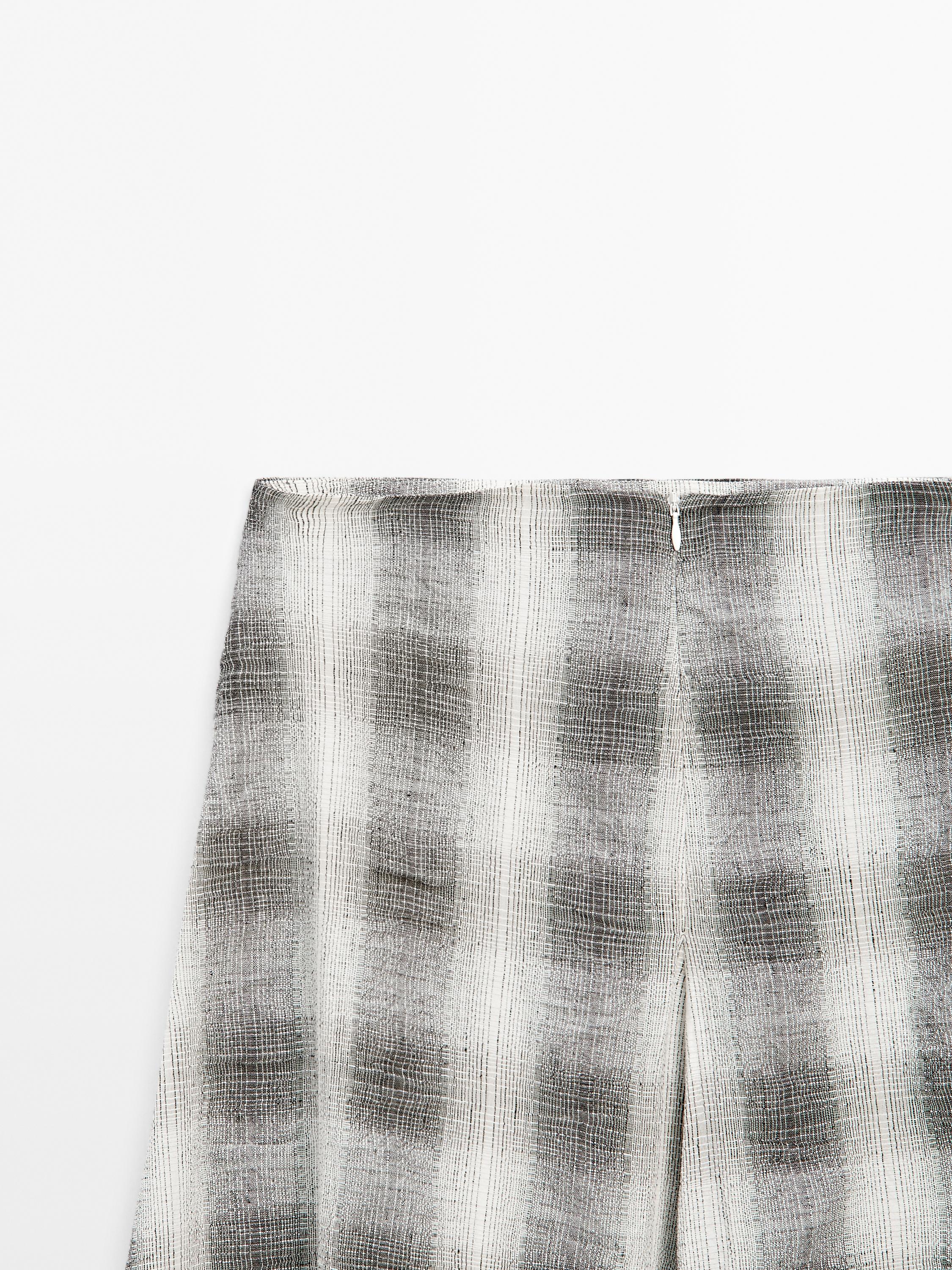 Long flared check skirt